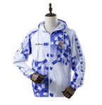 Abrigo Impermeable Real Madrid 2025/26