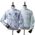 Chaqueta impermeable reversible Manchester City 2025/26