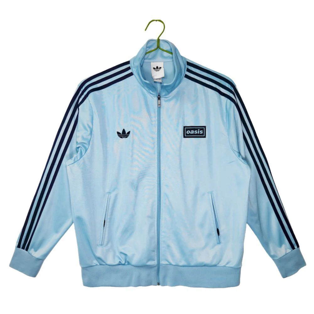 Abrigo Oasis x Adidas 2025