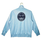 Abrigo Oasis x Adidas 2025